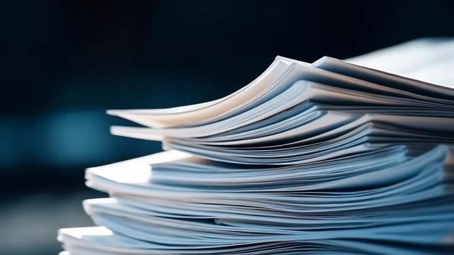 Bending stack of paper sheets