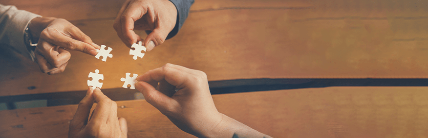 Banner Implement puzzle improve hand holding together by aFotostock